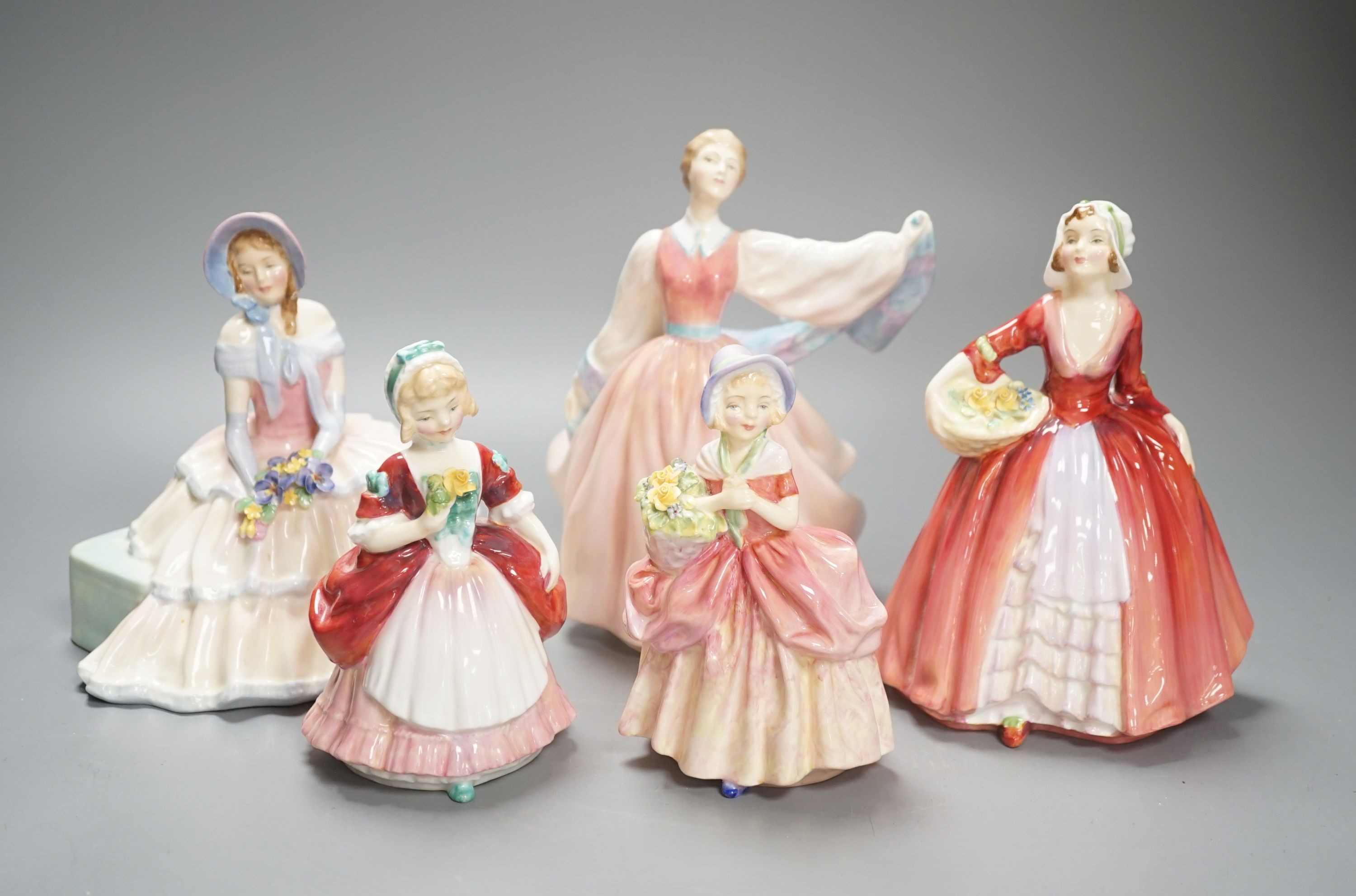 6 Royal Doulton figurines and 3 smaller figurines, Fair Lady HN2193, Gay Morning HN2135, Cissie HN1809, Valerie HN2107, Elegance HN2264, Lydia HN1908, Janet HN1537, Day Dreams HN1731 and Southern Bell HN2229